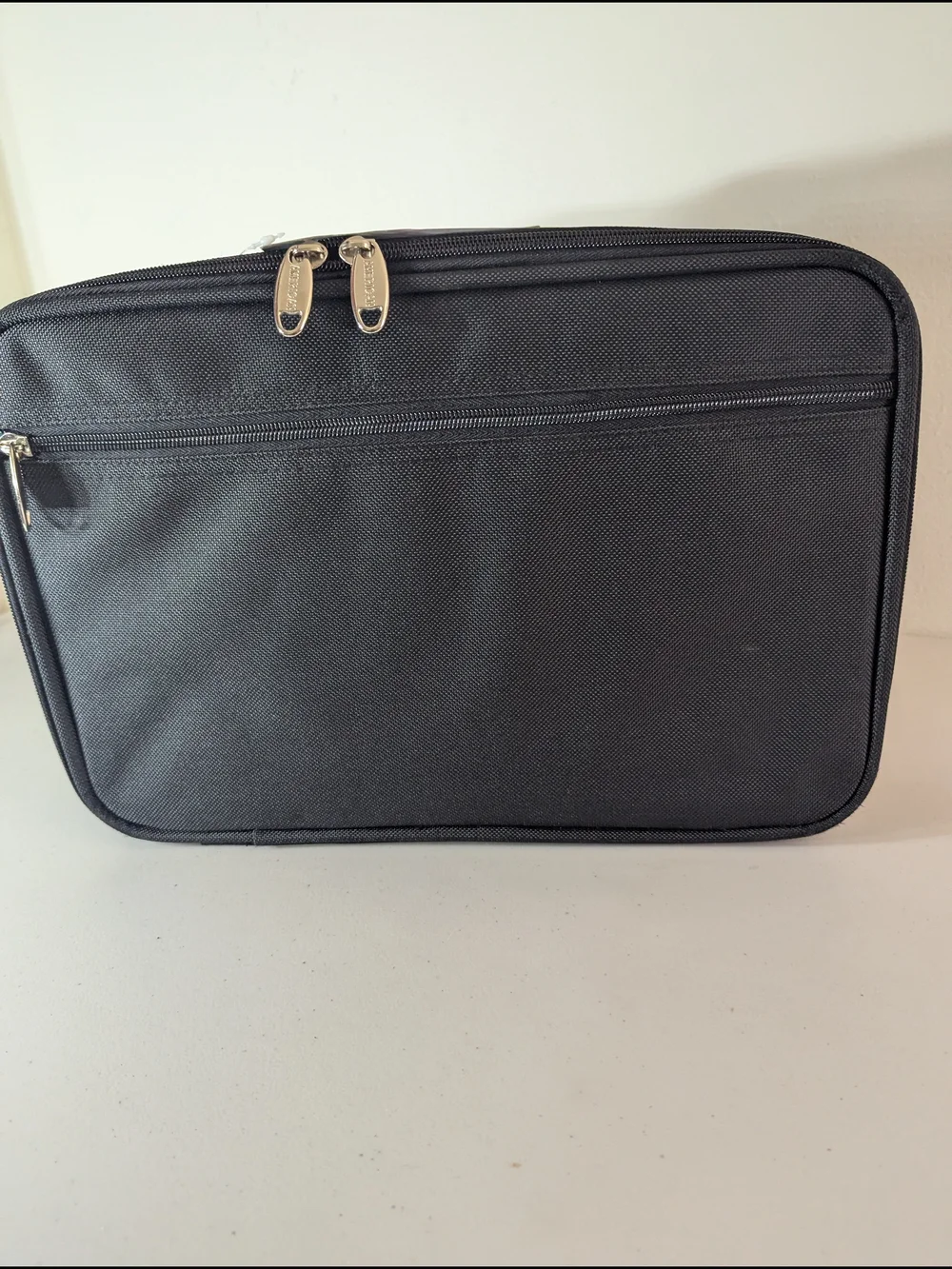 New with tags American Uni travel laptop and document organizer bag in black.